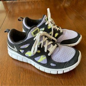 Purple and Lime Green Nike Tennis Shoes